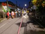 ฉีดล้างทำความสะอาดถนนรอบบริเวณตลาดสด